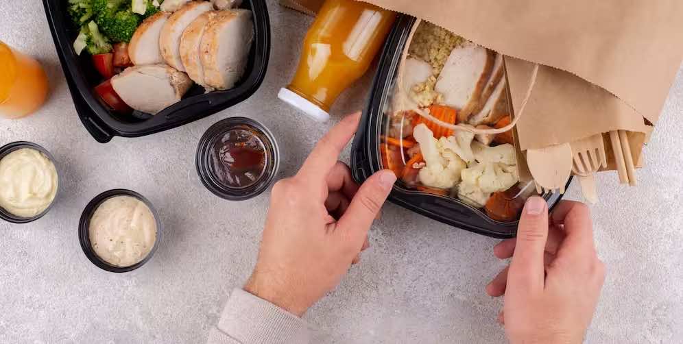 close-up-hands-holding-food-pack.jpg